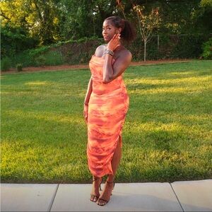 Orange dress with ruched side